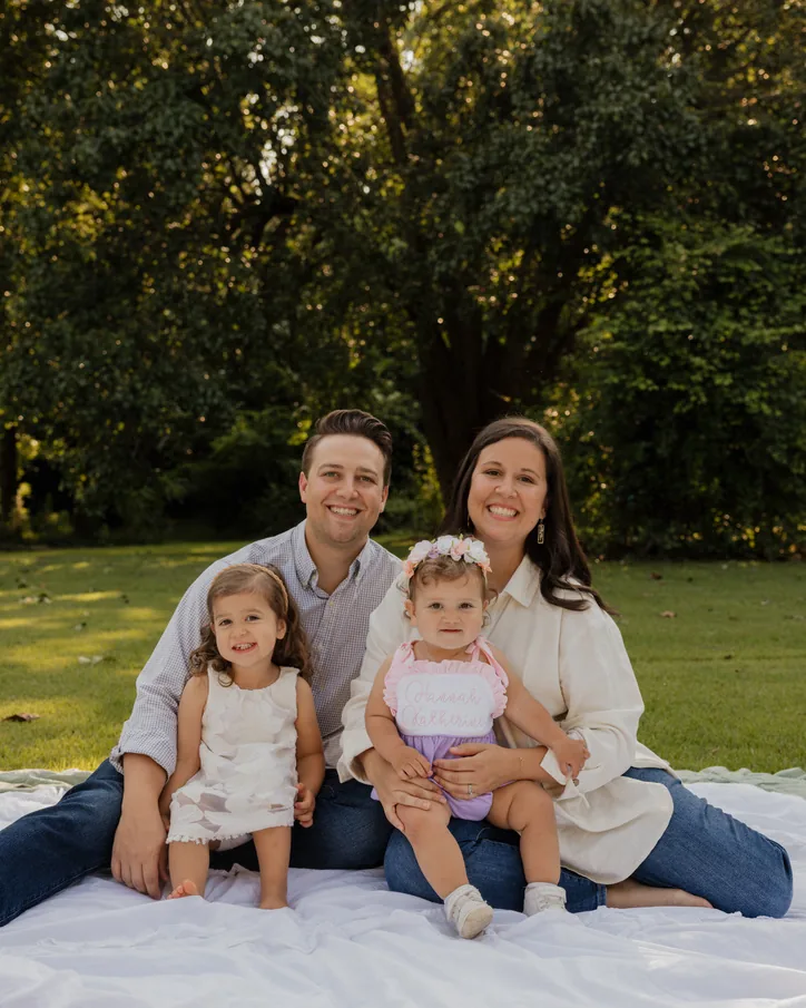 Caleb Lindsey, Worship Pastor, with his wife and their two daughters